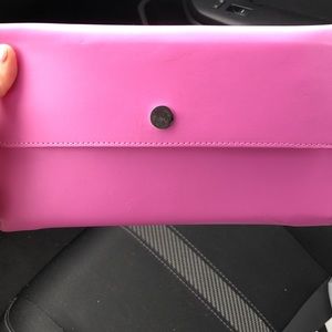 Hot pink travel wallet with passport cover